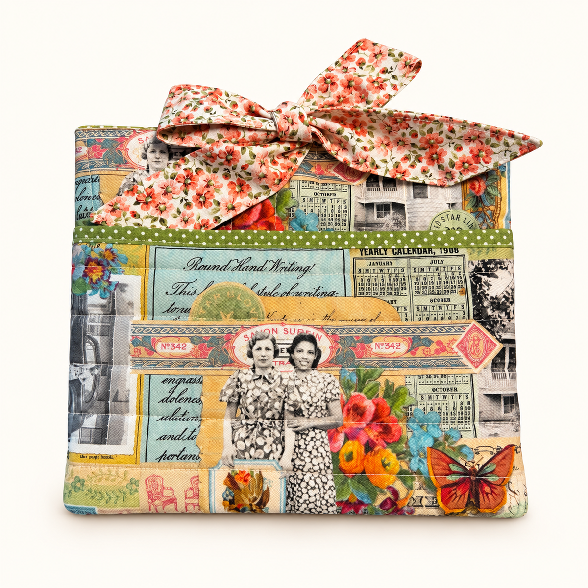 Handmade quilted book sleeve with front pocket and bow closure